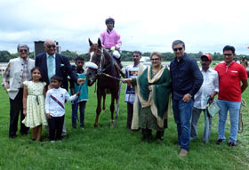 Trainer Narendra Lagad leading in Zip Along (Mustakim Alam),winner of Elegance Plate at Pune on Sunday along with the winning connections.